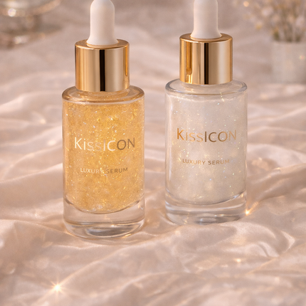 Luxury face serums with gold droppers displayed on satin background with soft lighting, showcasing glow and skincare elegance – KissICON serums collection
