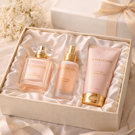 Luxury fragrance gift set with perfume, body mist and shower gel displayed in satin lined box with soft lighting – KissICON fragrance collection