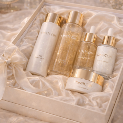 Luxury skincare gift set with serums, cleanser and cream displayed in satin lined box with gold detailing – KissICON skincare gift set collection