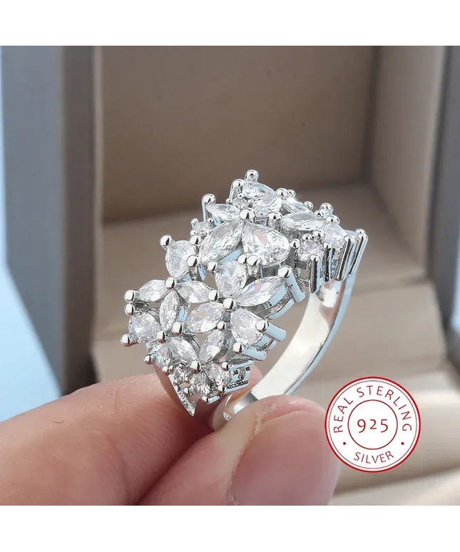 KissICON 7 KissIcon Silver Petal Rotating Ring - Natural Zircon Glow