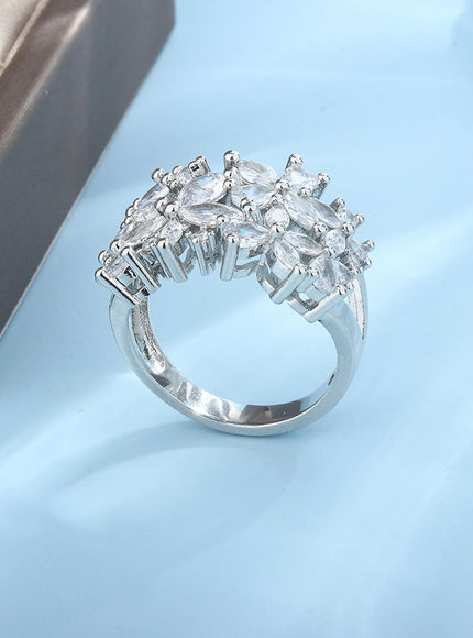 KissIcon Silver Petal Rotating Ring - Natural Zircon Glow