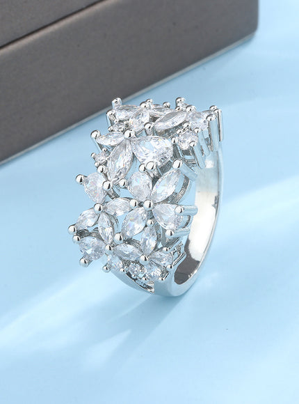 KissIcon Silver Petal Rotating Ring - Natural Zircon Glow