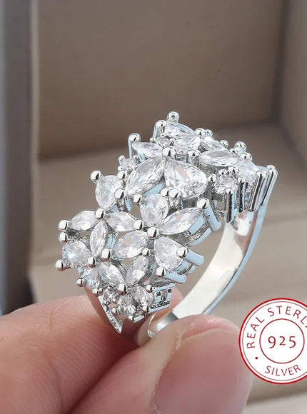 KissIcon Silver Petal Rotating Ring - Natural Zircon Glow