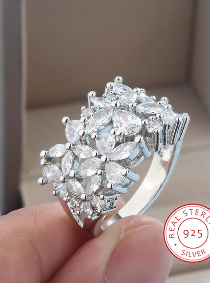 KissIcon Silver Petal Rotating Ring - Natural Zircon Glow