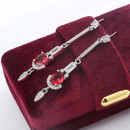 KissICON Baguette Oval Ruby Tassel Stud Earrings - Full Diamond Glow