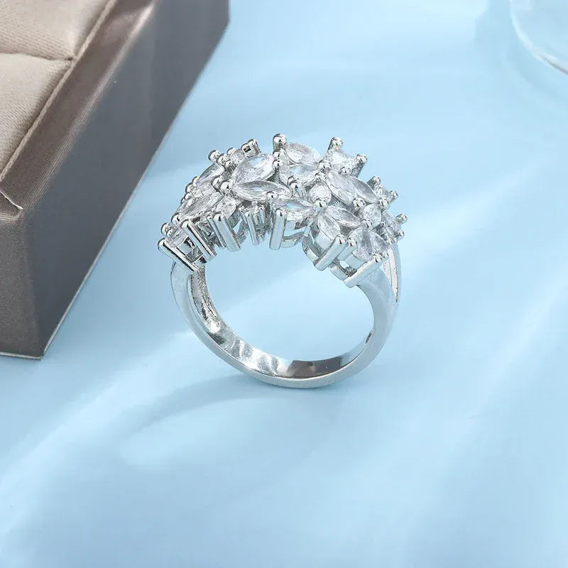 KissICON KissIcon Silver Petal Rotating Ring - Natural Zircon Glow