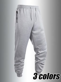 KissICON Men's Casual Sporty Cuffed Pants with Side Letter Zipper Pockets and Elastic Drawstring Waist, Trackpants Perfect for Year-round Wear. The Simple and Elegant Design Makes Them an Ideal Choice for Various Occasions, as Well as the Perfect Option