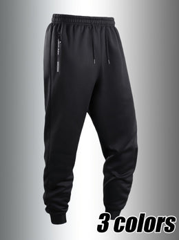 KissICON Men's Casual Sporty Cuffed Pants with Side Letter Zipper Pockets and Elastic Drawstring Waist, Trackpants Perfect for Year-round Wear. The Simple and Elegant Design Makes Them an Ideal Choice for Various Occasions, as Well as the Perfect Option