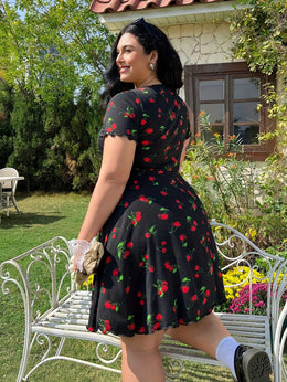 jkthpu-45 Plus Size Cherry Print A-Line Dress with Ruffle Detail, Elastic Waistband, V-Neck, Short Sleeve, Summer Style, Floral Garden Setting, Floral Dress | Vibrant Print Dress | Stretchy Fabric