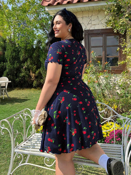 jkthpu-45 Plus Size Cherry Print A-Line Dress with Ruffle Detail, Elastic Waistband, V-Neck, Short Sleeve, Summer Style, Floral Garden Setting, Floral Dress | Vibrant Print Dress | Stretchy Fabric