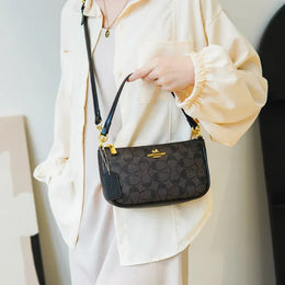 KissICON Vintage PVC Handbag – Chic Versatility