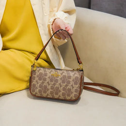 KissICON Vintage PVC Handbag – Chic Versatility