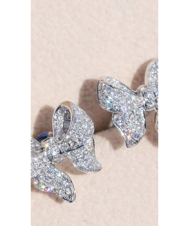 jkthpu-45 white KissIcon Elegant Zirconia Bow Studs - Romantic Shine