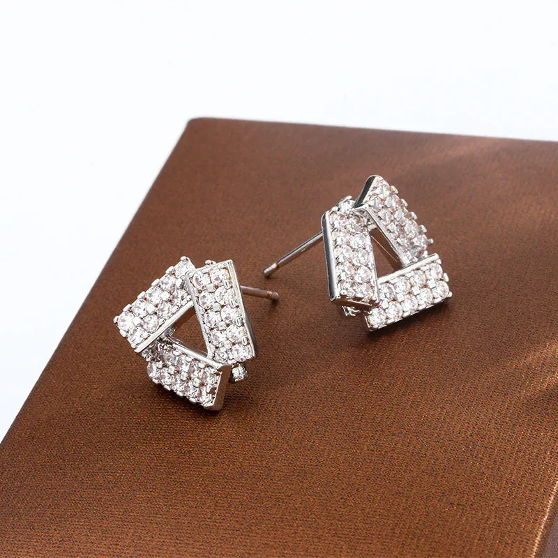 KissICON WHITE KissIcon Flash Diamond Triangle Earrings - Geometric Shine